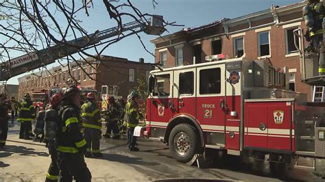 Firefighters Battle 2 Alarm Blaze At 3 Story Rowhome In East Baltimore Say Officials