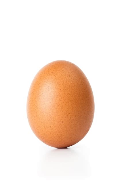 Premium Photo | A standing egg on a white background