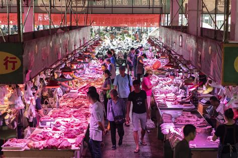 Chinas Sizzling Pork Rally Seen Easing On Inventory Sales Bloomberg