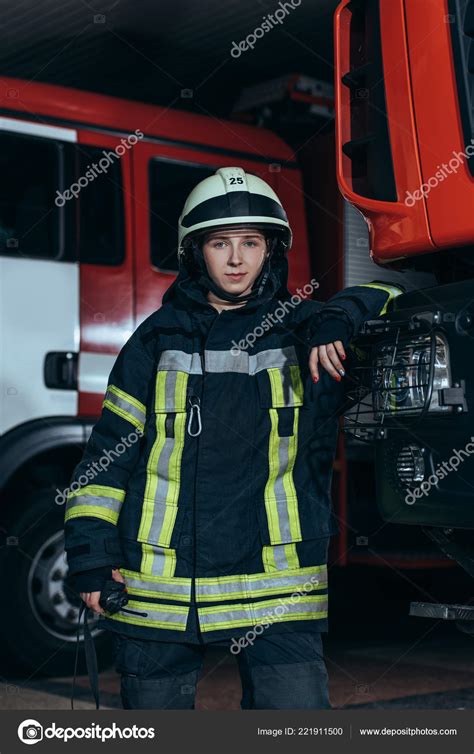 Portrait Female Firefighter Protective Uniform Portable Radio Set Fire ...