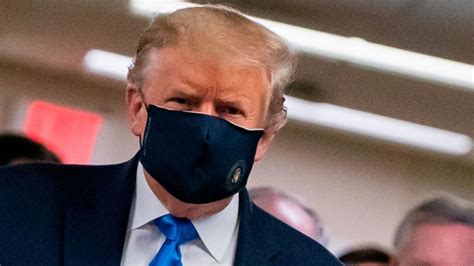 Trump wears mask in public setting for the first time during visit to ...