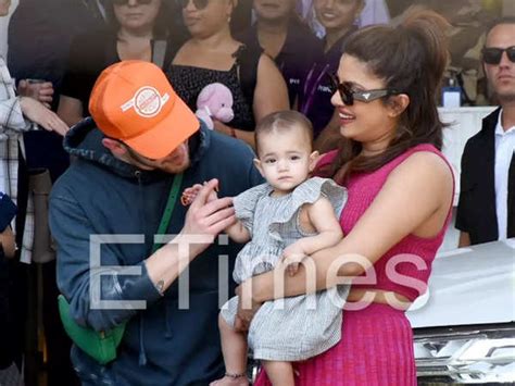 Priyanka Chopra Arrives In Mumbai With Nick Jonas And Daughter Malti