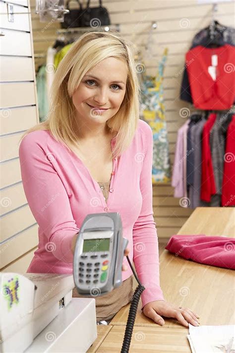 Female Sales Assistant In Clothing Store Stock Photo Image Of Clerk