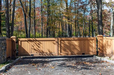 A Tongue And Groove Wooden Paneled Entry Gate Offers Maximum Privacy