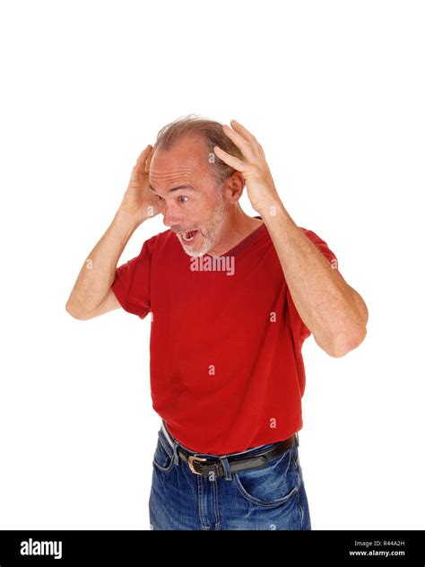 Old man scared with hands on head Stock Photo - Alamy