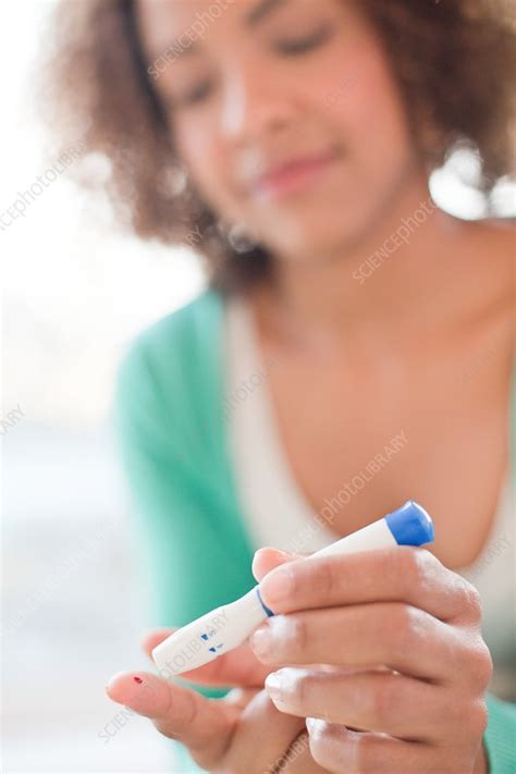 Woman Doing Finger Prick Test Stock Image F Science Photo