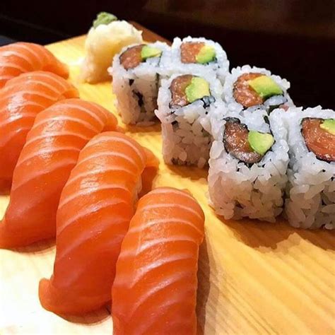 Salmon Sushi Rolls And Salmon Nigiri Sushi Homemade Sushi Sushi Salmon Sushi Rolls