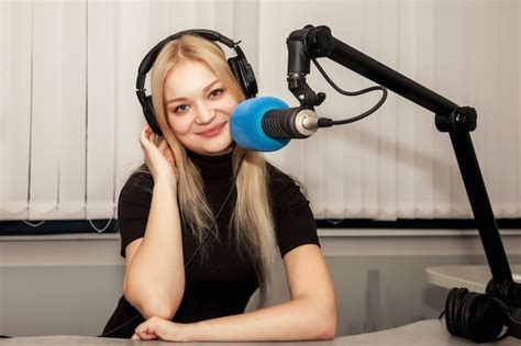 Premium Photo Young Woman Dj Radio Host In Studio With Headphones