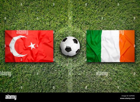 Turkey vs. Ireland flags on green soccer field Stock Photo - Alamy