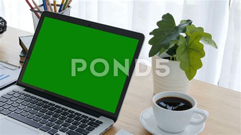 Computer Laptop Green Screen On Workplace Table Stock Footage Ad