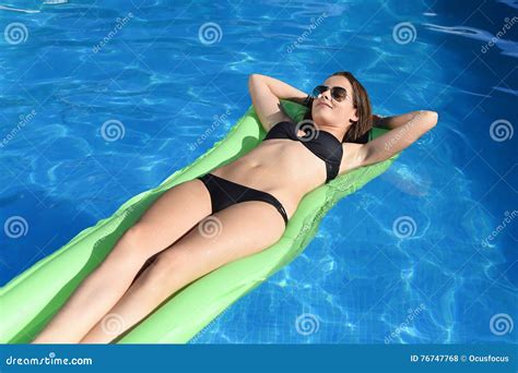 Young Happy Beautiful Woman In Bikini And Sunglasses Lying Relax On