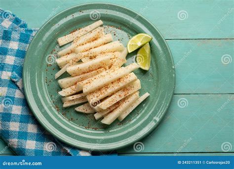 Mexican Yam Bean Also Called Jicama With Chili Powder Stock Image