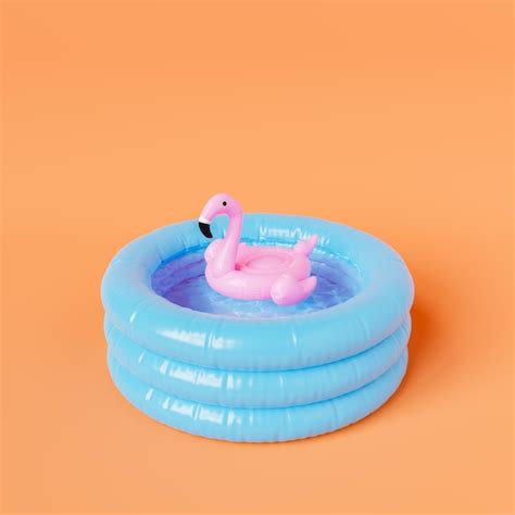 Premium Photo | Toy flamingo in inflatable pool in studio