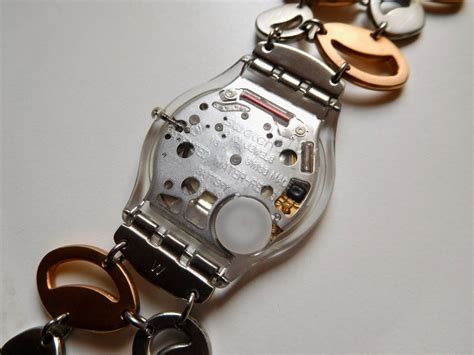 Swatch Skin ultradünn flach Uhr läuft Armband Strass Kupfer Kaufen