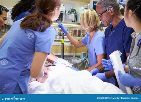 Medical Team Working On Patient In Emergency Room Royalty-Free Stock ...