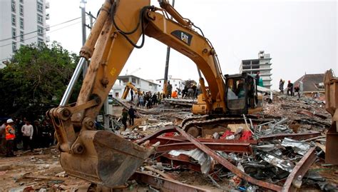 Emergency Crews Search For Survivors After Building Collapse In