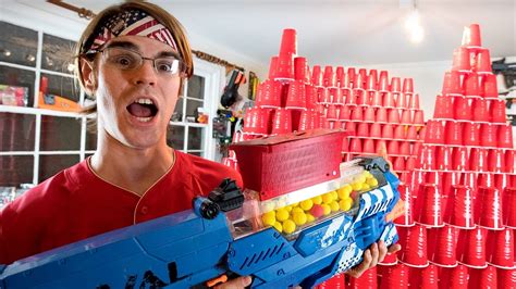 Worlds Greatest Nerf Gun Vs Over 1001 Cups Ft Aaron Esser Youtube