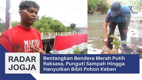 Bentangkan Bendera Merah Putih Raksasa Punguti Sampah Hingga Hanyutkan