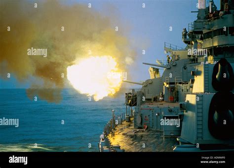 Guns firing from the USS Iowa Stock Photo - Alamy