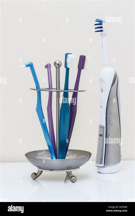 Toothbrushes In Bathroom Stock Photo Alamy