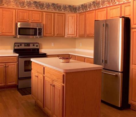 What New Flooring Goes With 1990s Oak Cabinets Carla Bast Design