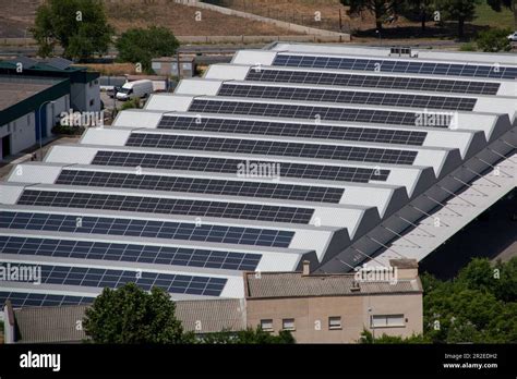 Electric Power Solar Panels Placed On The Roof Of An Industrial