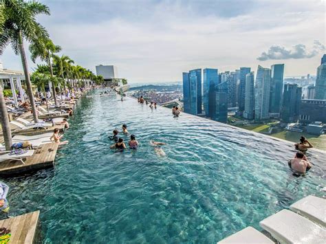 The Marina Bay Sands Hotel in Singapore has a stunning infinity rooftop pool on the hotel's 57th ...