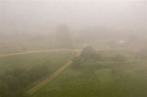 Drone Photography of Fields and Roads during Dense Fog Stock Image - Image of countryside, green ...