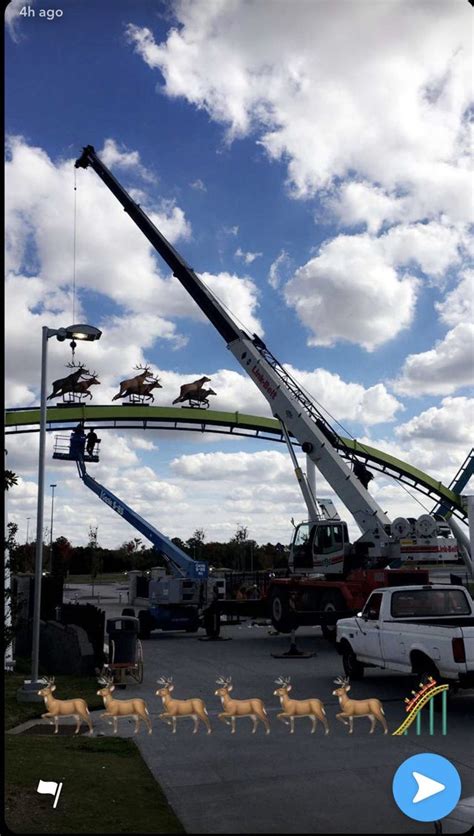 Winterfest decorations going up on Fury 325. I love it! : r/rollercoasters