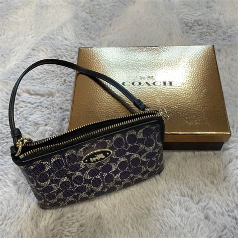 Coach B Purple Signature Canvas Coated Small Zip Wristlet Girly