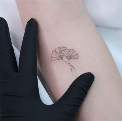 Fine Line Ginkgo Leaves Tattoo On The Inner Forearm