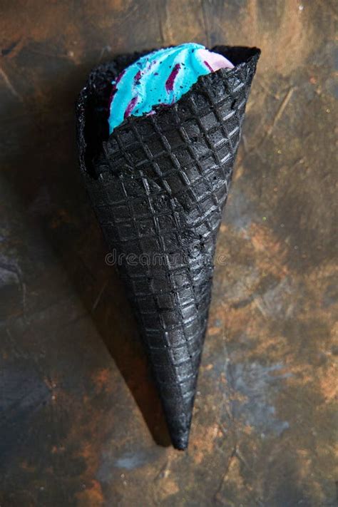 Black Waffle Cones Of Ice Cream On A Dark Background Top View Stock