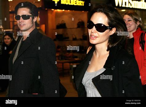 Brad Pitt And Angelina Jolie At Heathrow Airport Where They Are Due To