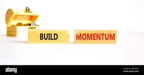 Build Momentum Symbol Concept Words Build Momentum On Wooden Blocks