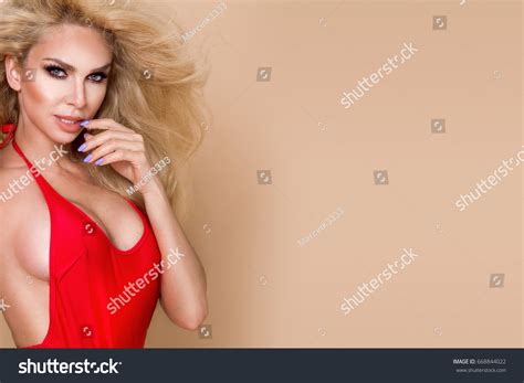 Sexy Busty Blonde Lifeguard Woman Red Stock Photo Shutterstock