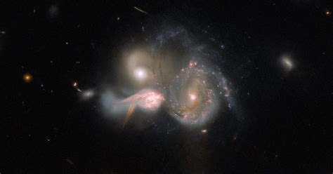 Hubble Snaps Rare View Of 3 Galaxies On A Collision Course Cnet