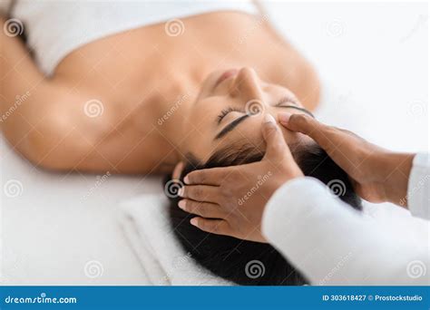 Serene Eastern Woman Receiving Head Massage At Spa Stock Image Image