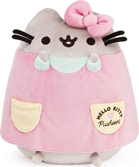 A Hello Kitty Plush Toy With A Pink Bow On Its Head And Eyes