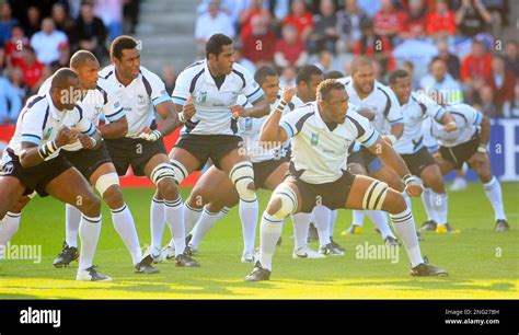 Fiji's players perform their pre-match Haka before the Rugby World Cup Group B match between ...