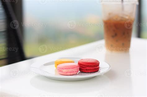 Sweet And Colourful French Macarons On White Table 19863264 Stock Photo