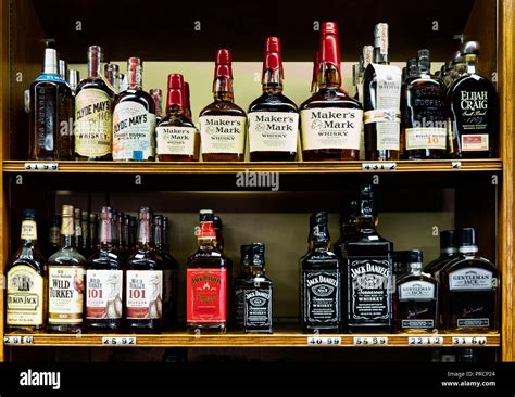 Shelves Full Of Bottles Of Premium Whiskey In A Liquor Store In