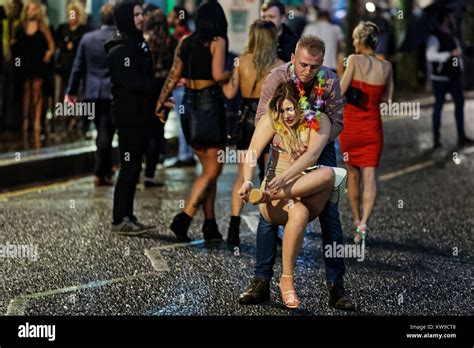 A Woman Is Grabbed By Her Partner Stock Photo Alamy