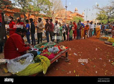 Devotees Stand In A Queue To Offer Prayers To Lord Shiva On The