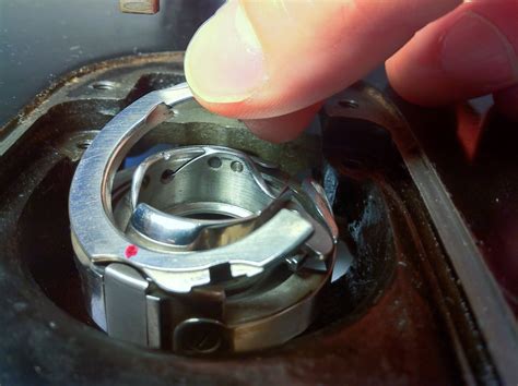 How To Put A Singer Bobbin Case And Retaining Ring Back Together