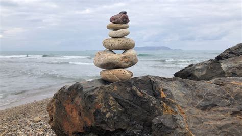 Rock Cairn at the Sea Beach · Free Stock Video