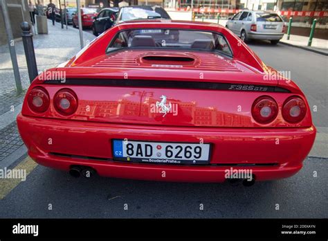 Red parked Ferrari F355 gts convertible in the famous red ferarri color ...