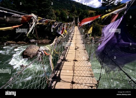 Tibetan Bridge Over The Chamkhar Chu River Bhutan Stock Photo Alamy