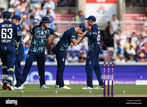 Ben Stokes Of England Celebrates Catching Hardik Pandya Of India With Joe Root Of England Stock