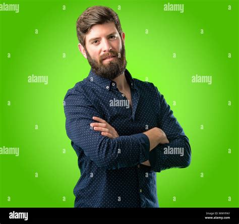 Young Hipster Man With Big Beard With Crossed Arms Confident And Happy