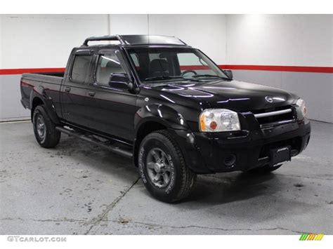 Super Black Nissan Frontier Xe V Crew Cab X Exterior Photo